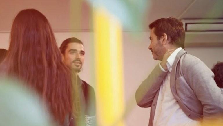 People in conversation at a scale-up event